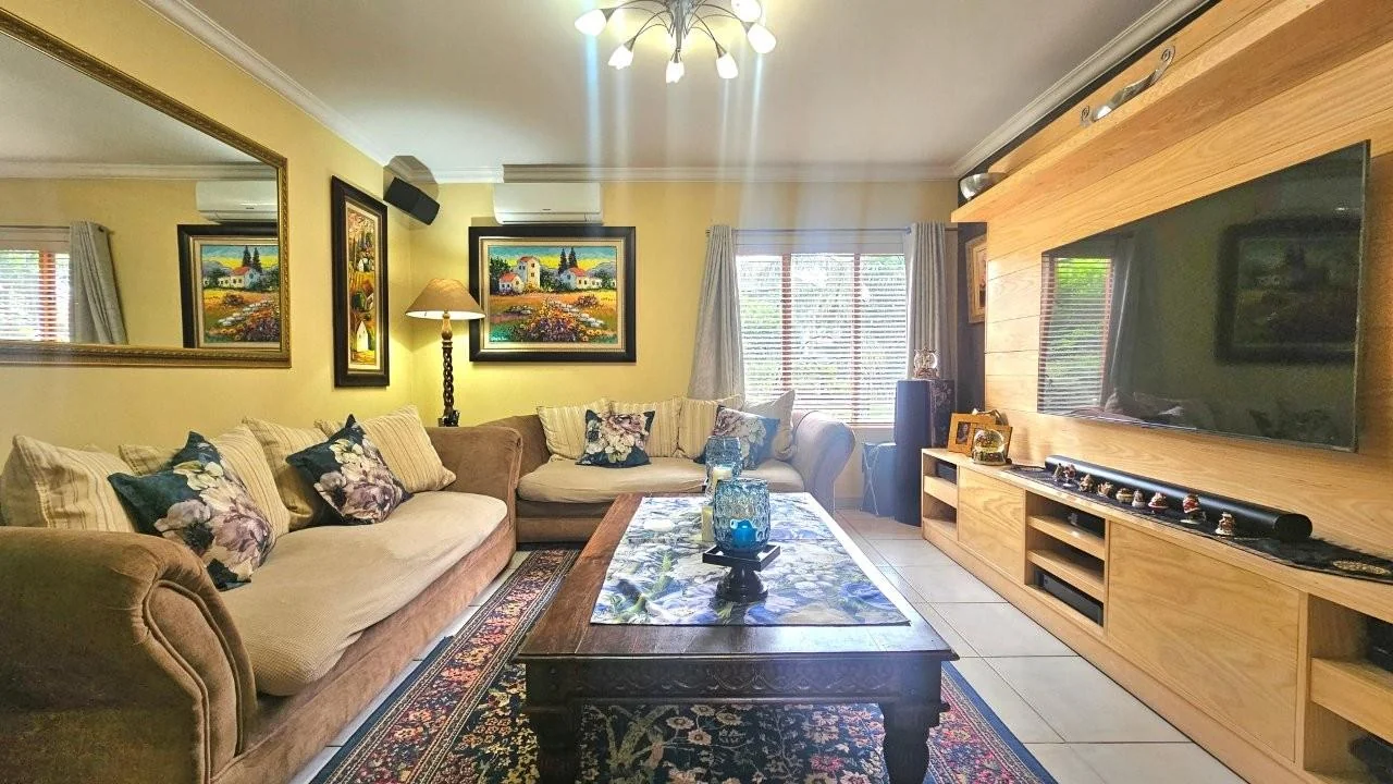 GENEROUS FAMILY HOME WITH FLATLET IN THE HEART OF MIDSTREAM ESTATE.