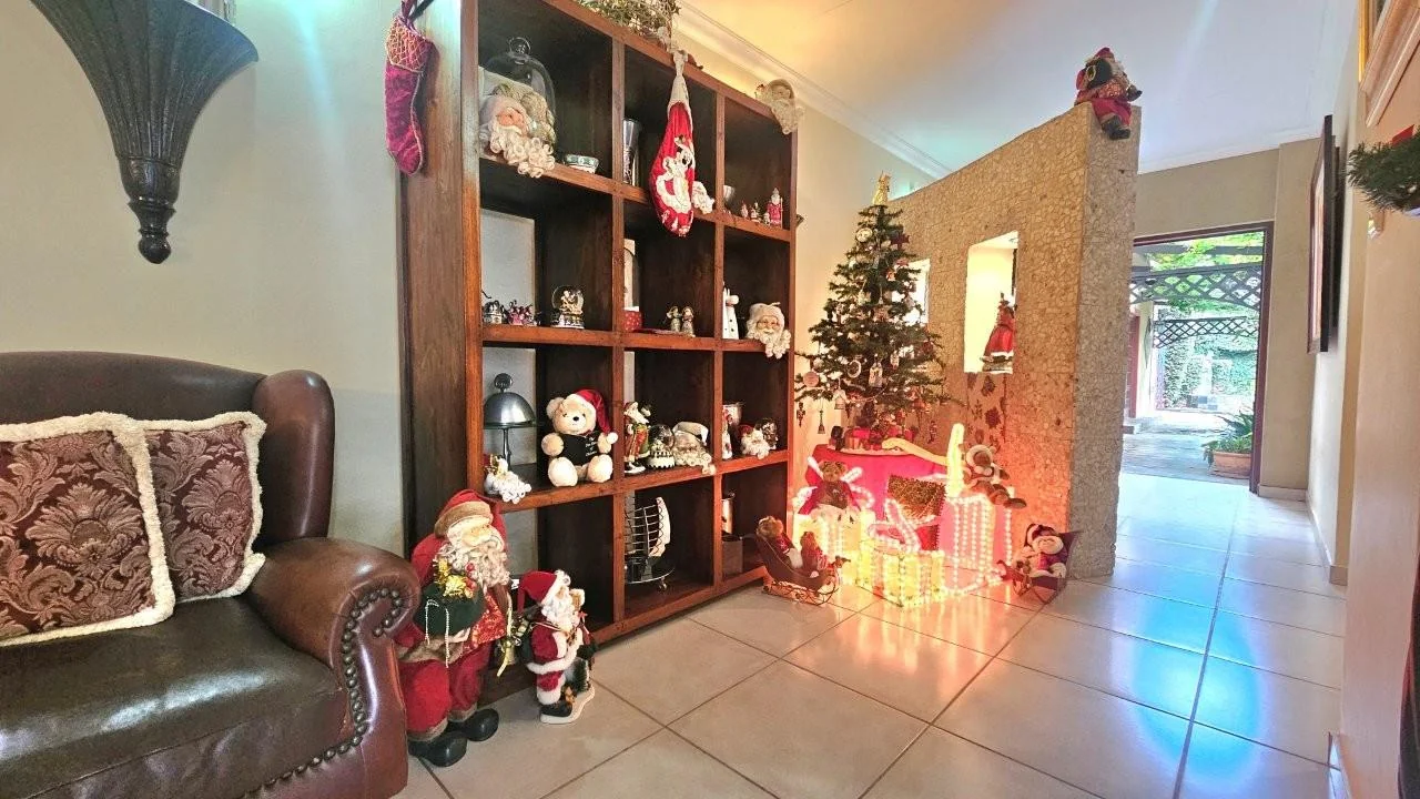 GENEROUS FAMILY HOME WITH FLATLET IN THE HEART OF MIDSTREAM ESTATE.