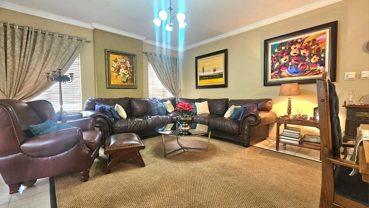 GENEROUS FAMILY HOME WITH FLATLET IN THE HEART OF MIDSTREAM ESTATE.