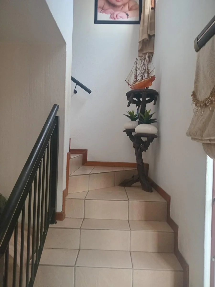 A 3 bed, 2 bath double story house in Country View , Midrand.