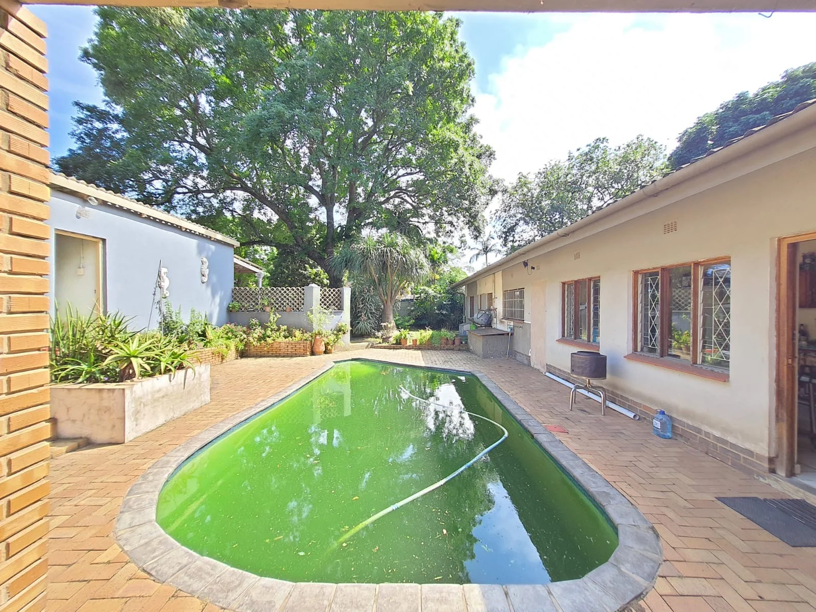 4 Bedroom Home with 1 Bedroom Garden Flat