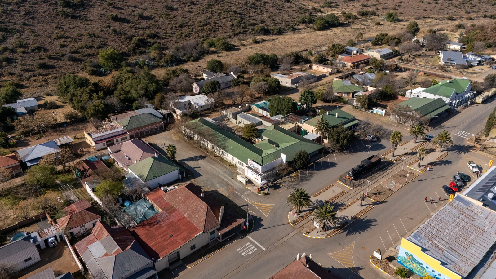 Substantial Redevelopment Opportunity: Landmark 12-Unit Complex on Main Street with Vast Commercial Potential
