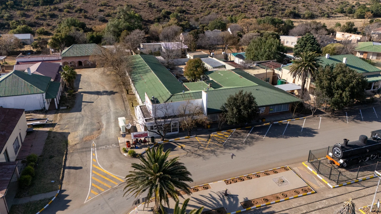 Substantial Redevelopment Opportunity: Landmark 12-Unit Complex on Main Street with Vast Commercial Potential