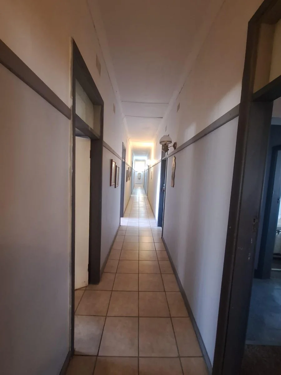 Substantial Redevelopment Opportunity: Landmark 12-Unit Complex on Main Street with Vast Commercial Potential