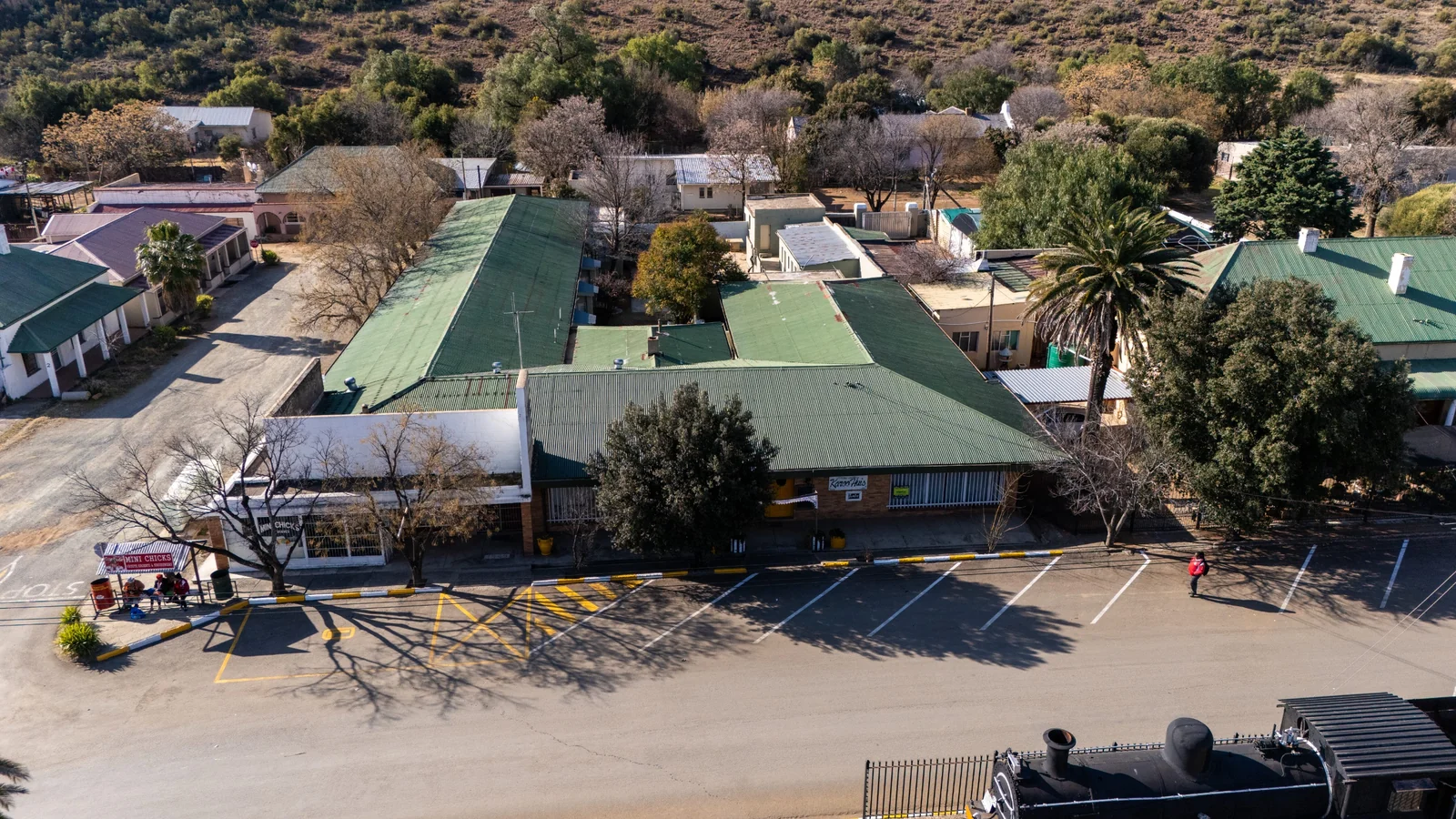 Substantial Redevelopment Opportunity: Landmark 12-Unit Complex on Main Street with Vast Commercial Potential