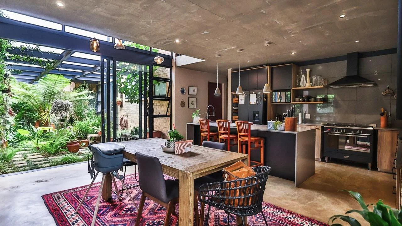 A STRIKING INDUSTRIAL-MODERN HOME WITH A PRIME MIDSTREAM RIDGE LOCATION, MOMENTS FROM AN  ACCESS GATE