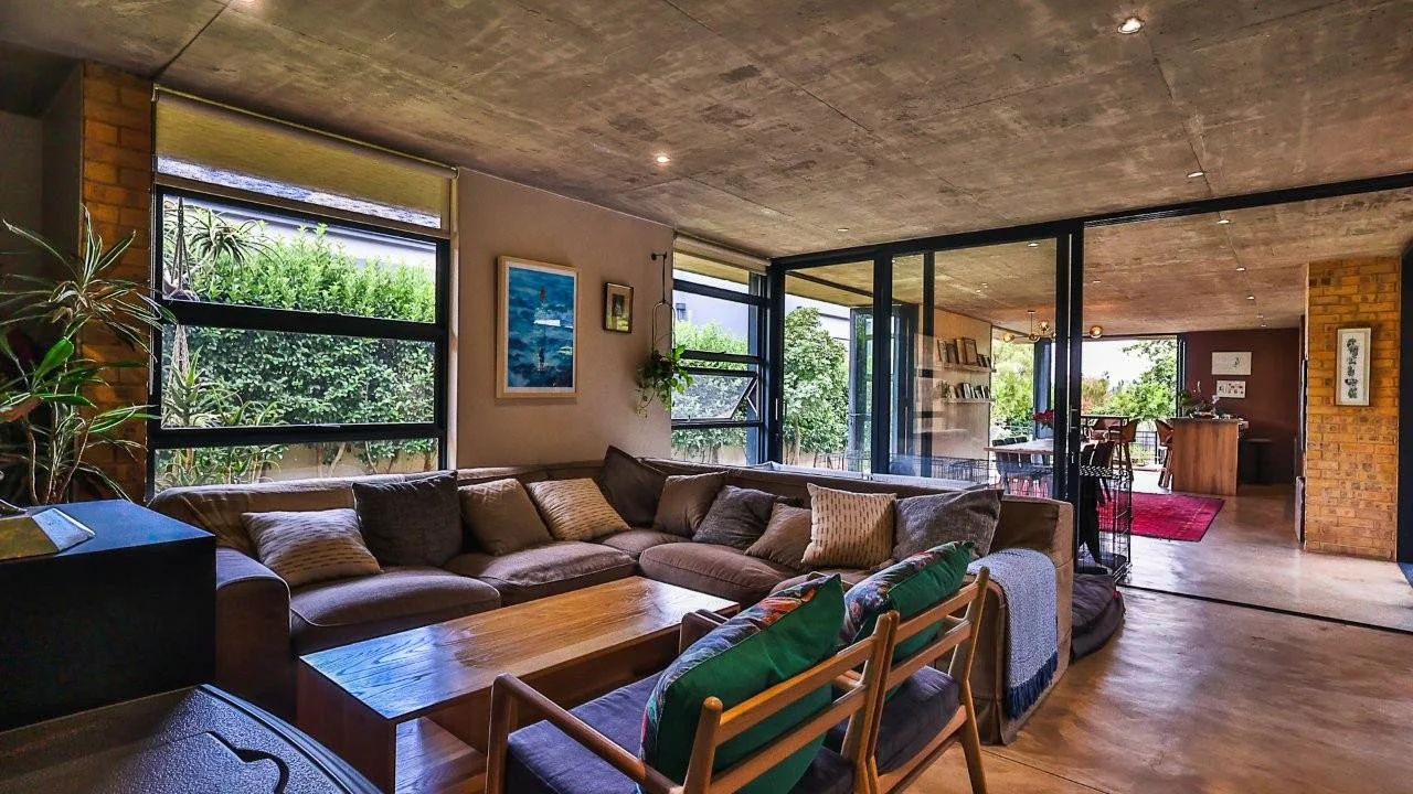 A STRIKING INDUSTRIAL-MODERN HOME WITH A PRIME MIDSTREAM RIDGE LOCATION, MOMENTS FROM AN  ACCESS GATE