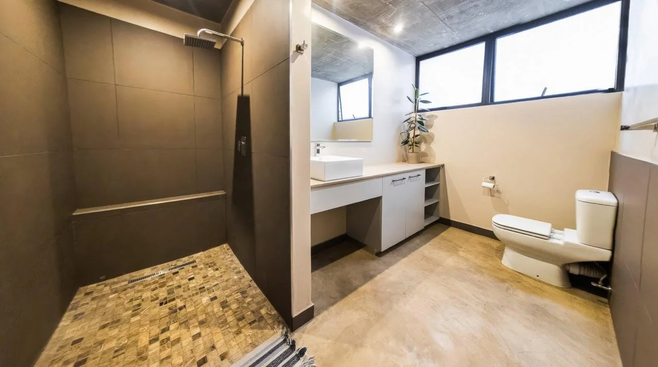 A STRIKING INDUSTRIAL-MODERN HOME IN  A PRIME MIDSTREAM RIDGE LOCATION, MOMENTS FROM AN  ACCESS GATE