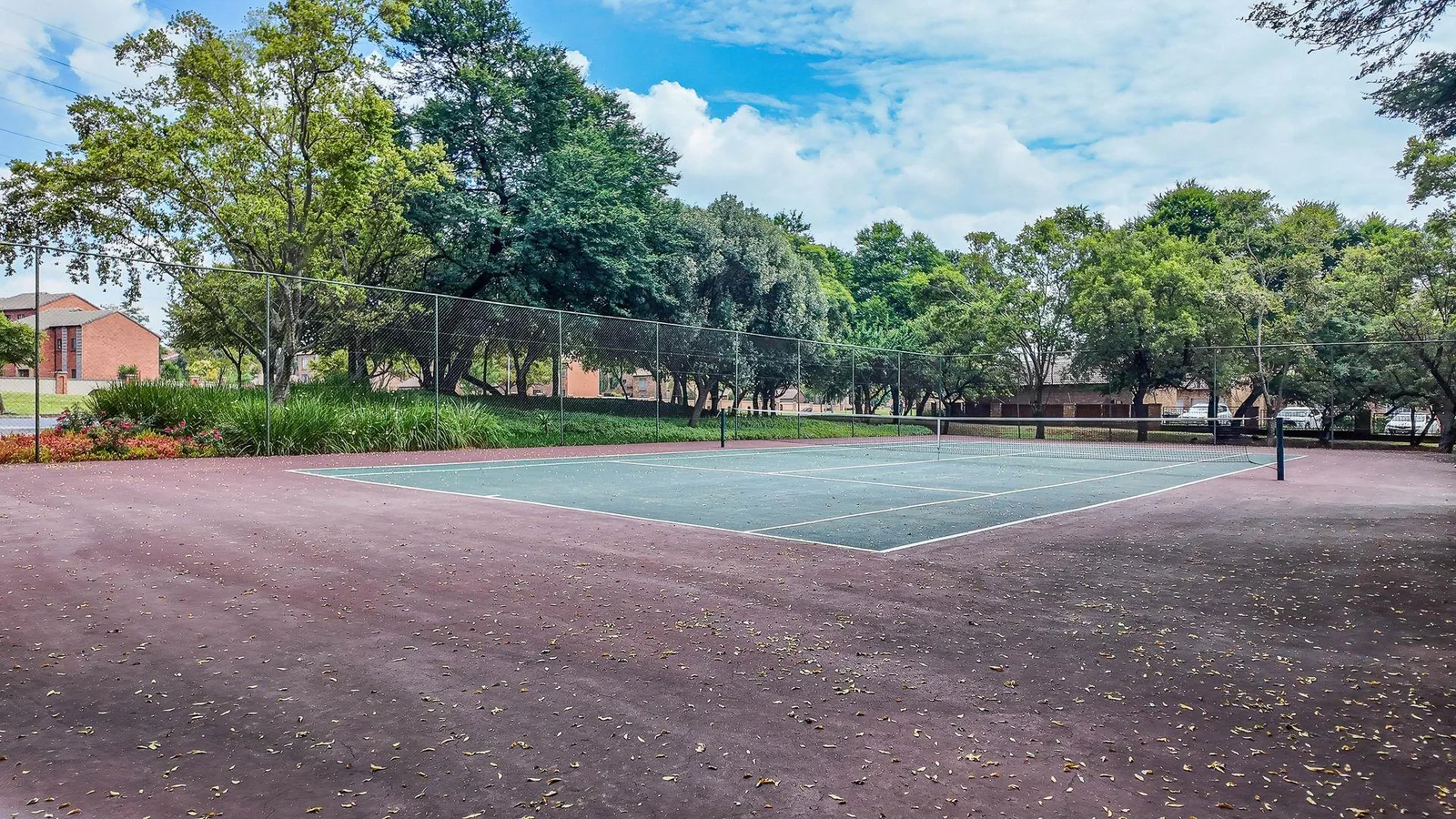 Welcome to this spacious 120sqm first-floor corner unit located in the ever-popular and well-secured Eco Park Estate, right in the heart of Centurion.