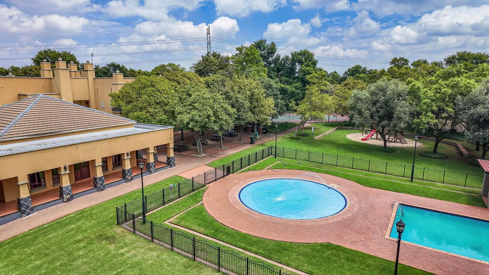 Welcome to this spacious 120sqm first-floor corner unit located in the ever-popular and well-secured Eco Park Estate, right in the heart of Centurion.