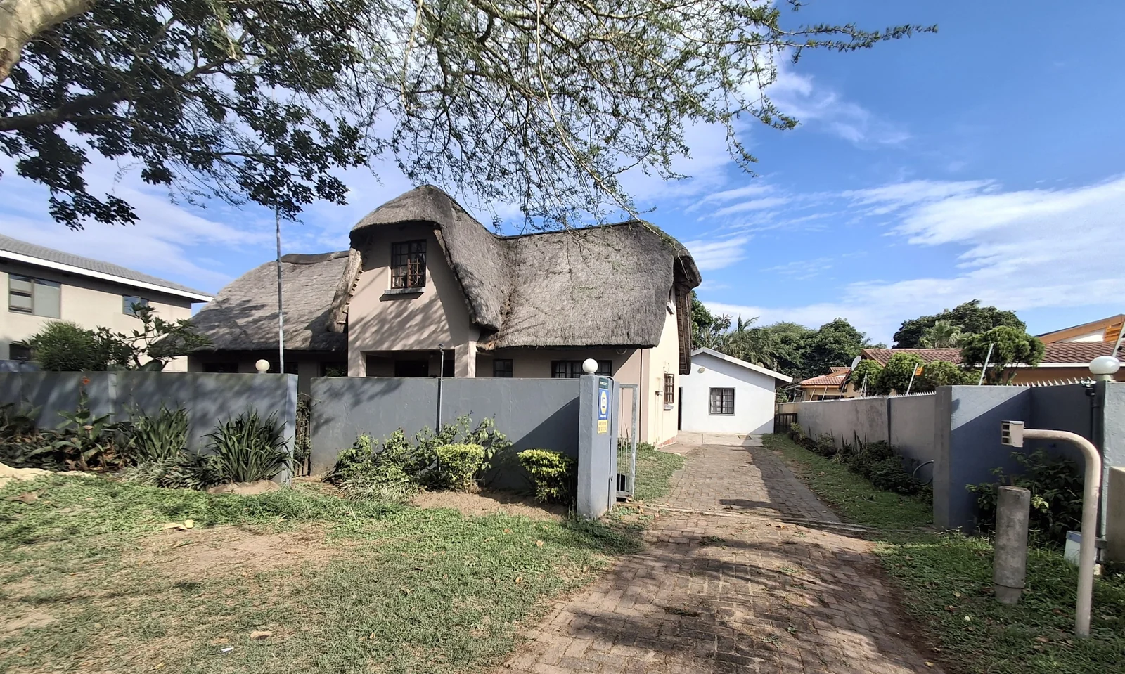 Thatched roof and warm wood interior