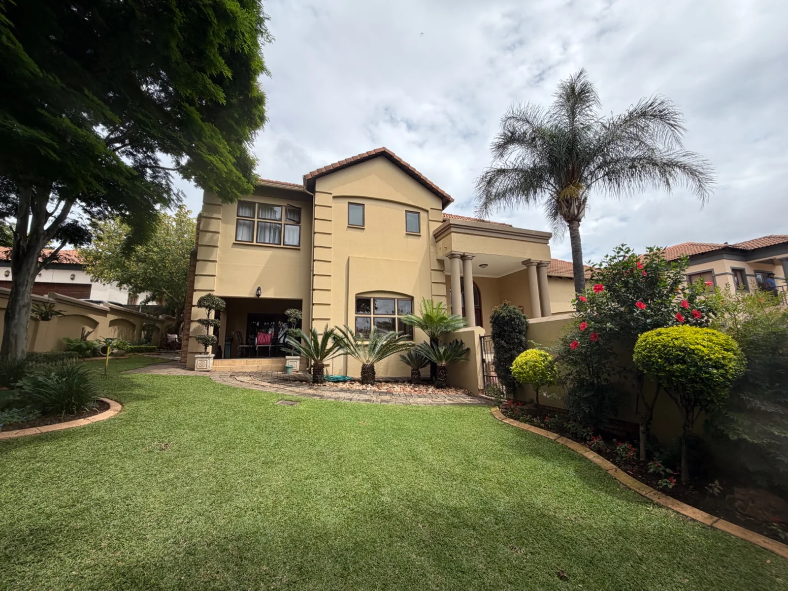 CHARM AND STYLE TEAMED WITH ELEGANCE ..... INSIDE A SECURITY ESTATE!