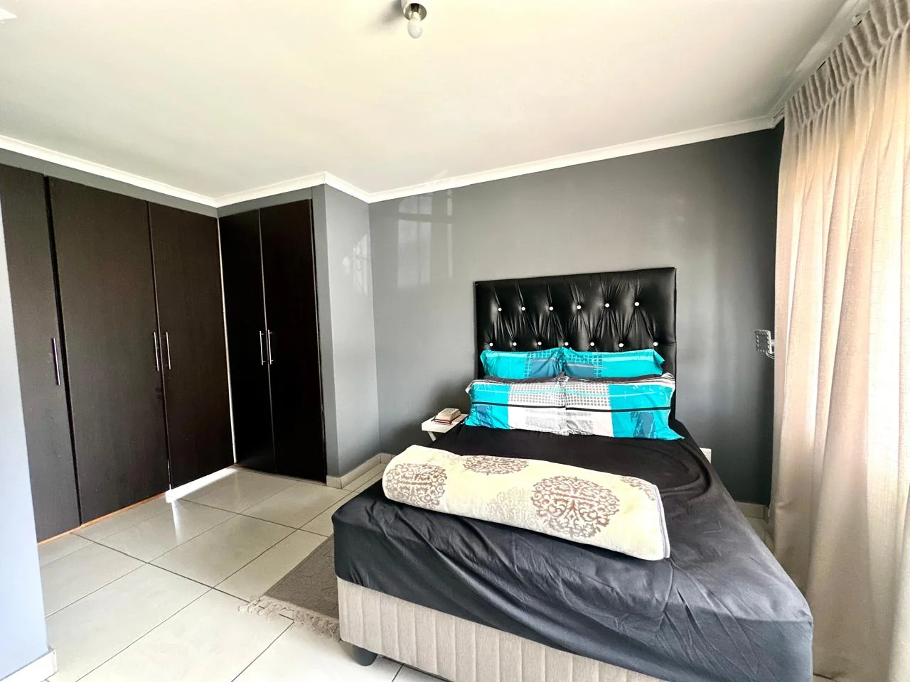 SECURE TWO BEDROOM HOME WITH SPACIOUS LIVING AND WATER INCLUDED