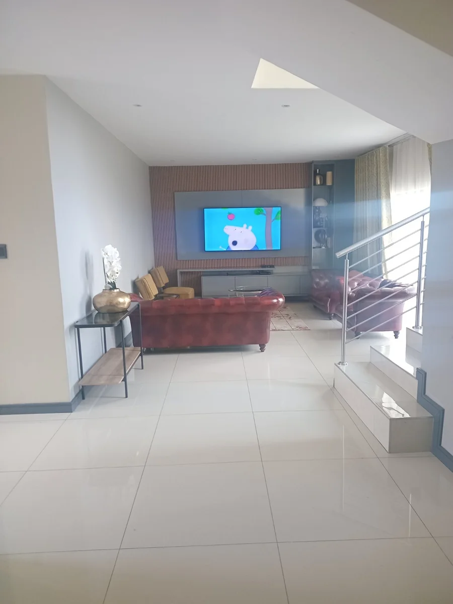 A lovely 5 bed, 4 bath double story house in Sagewood, Midrand.