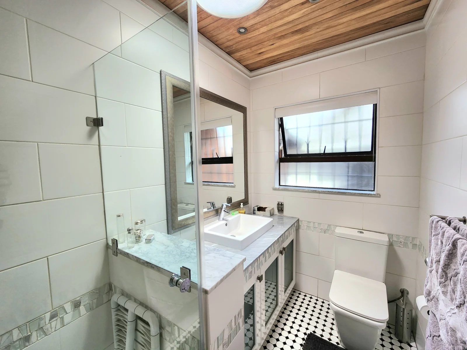 Light Filled Living, Curated Gardens and Energy Independence in Farrarmere