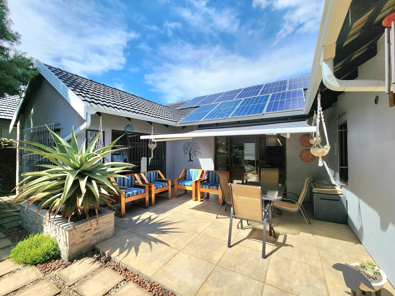 Light Filled Living, Curated Gardens and Energy Independence in Farrarmere