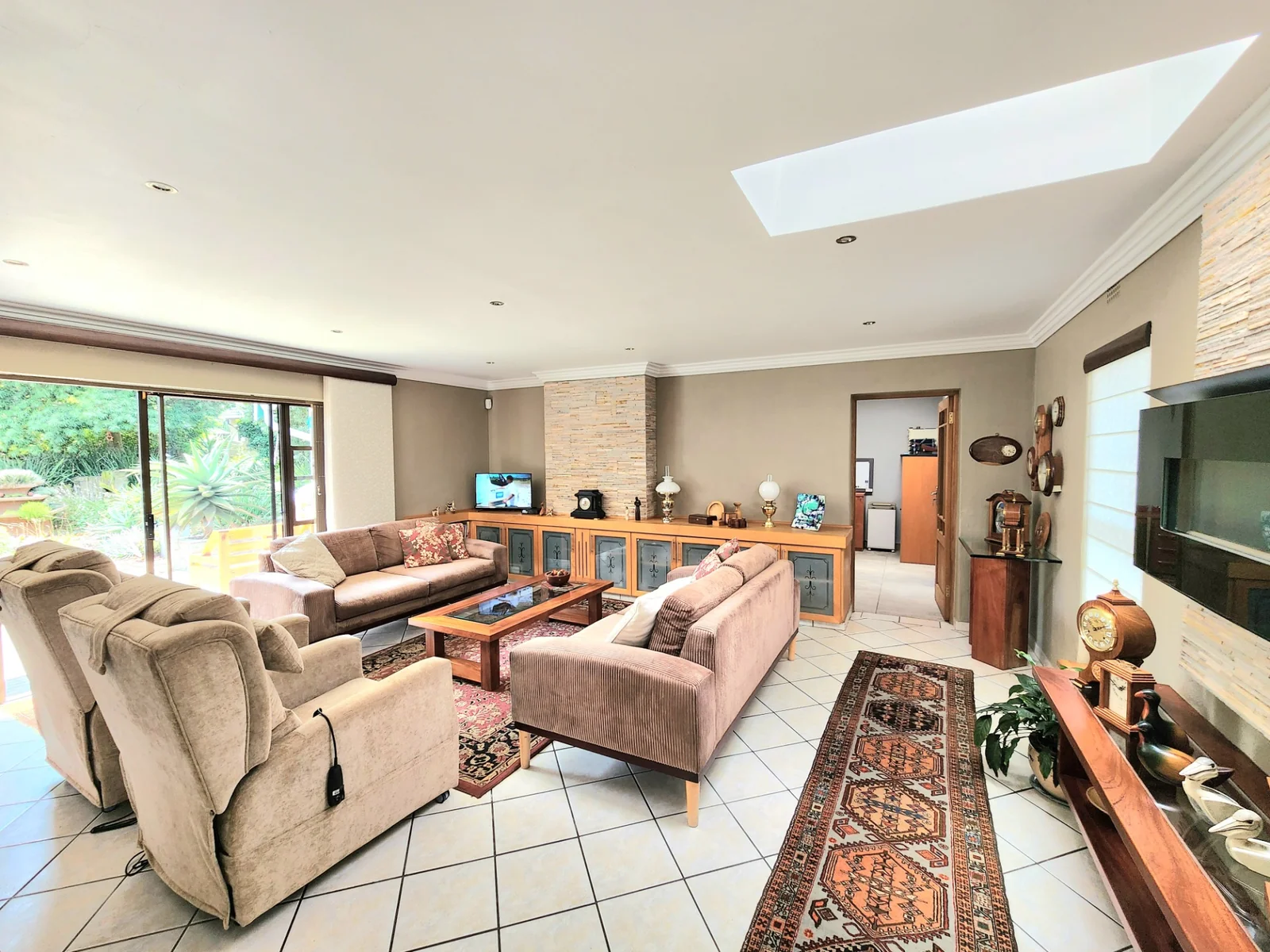 Light Filled Living, Curated Gardens and Energy Independence in Farrarmere