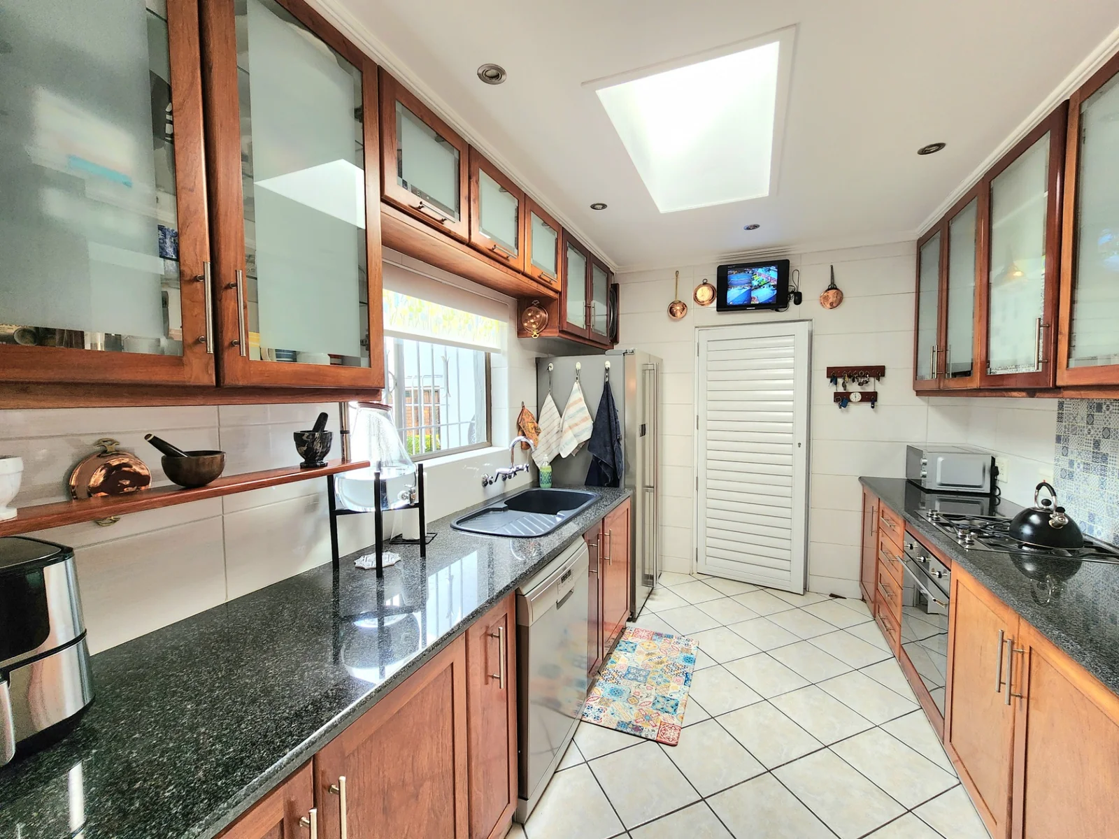 Light Filled Living, Curated Gardens and Energy Independence in Farrarmere