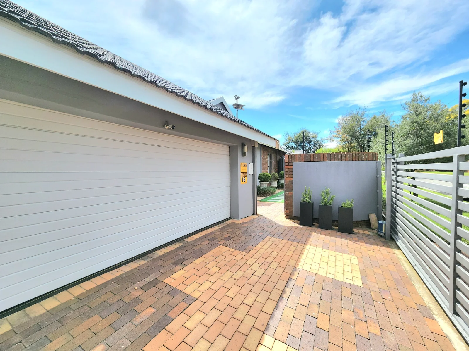 Light Filled Living, Curated Gardens and Energy Independence in Farrarmere