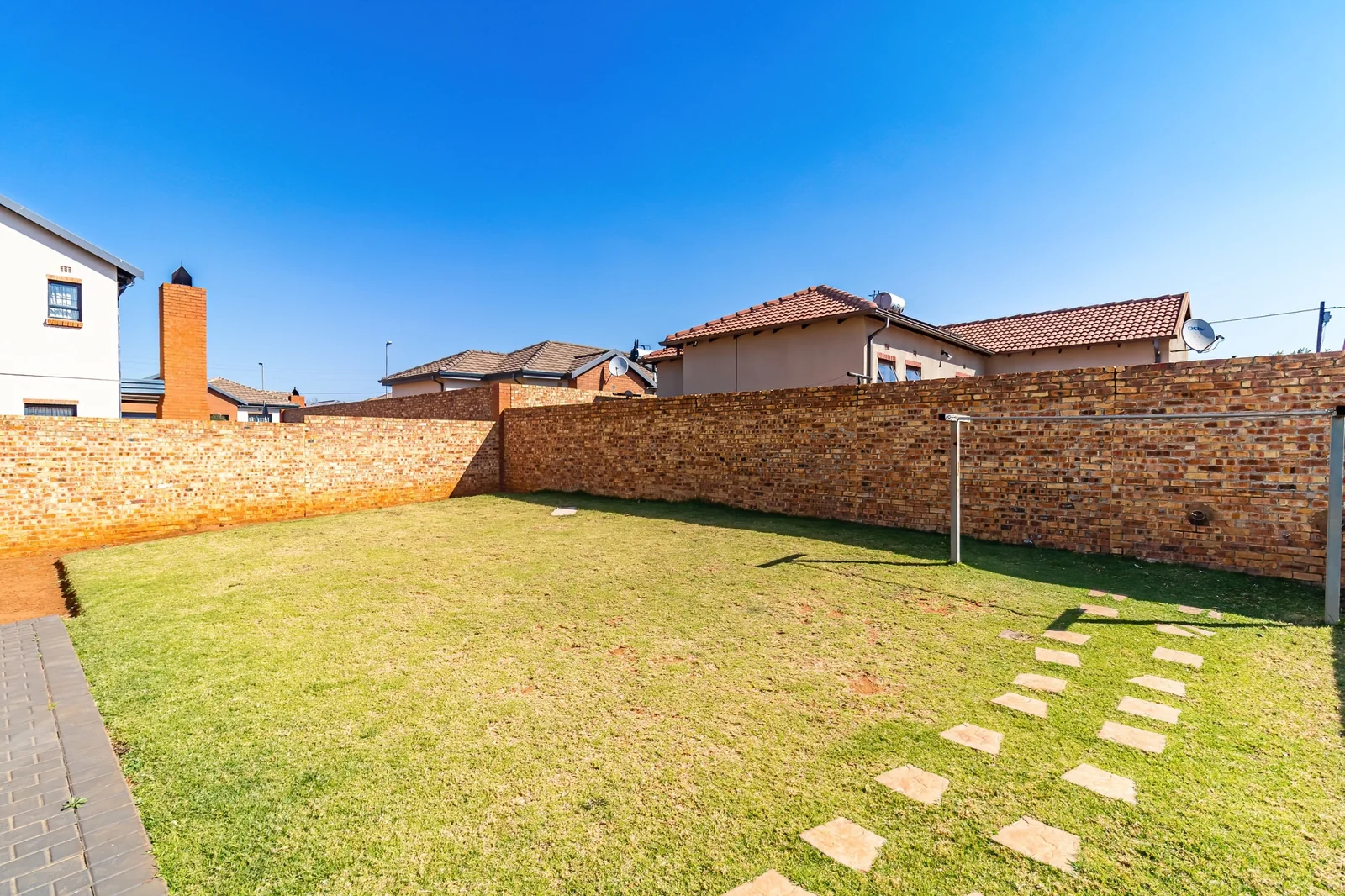 Secure Family Living in Clayville, Midrand: Spacious 4 Bedroom Estate Home with Big Yard.