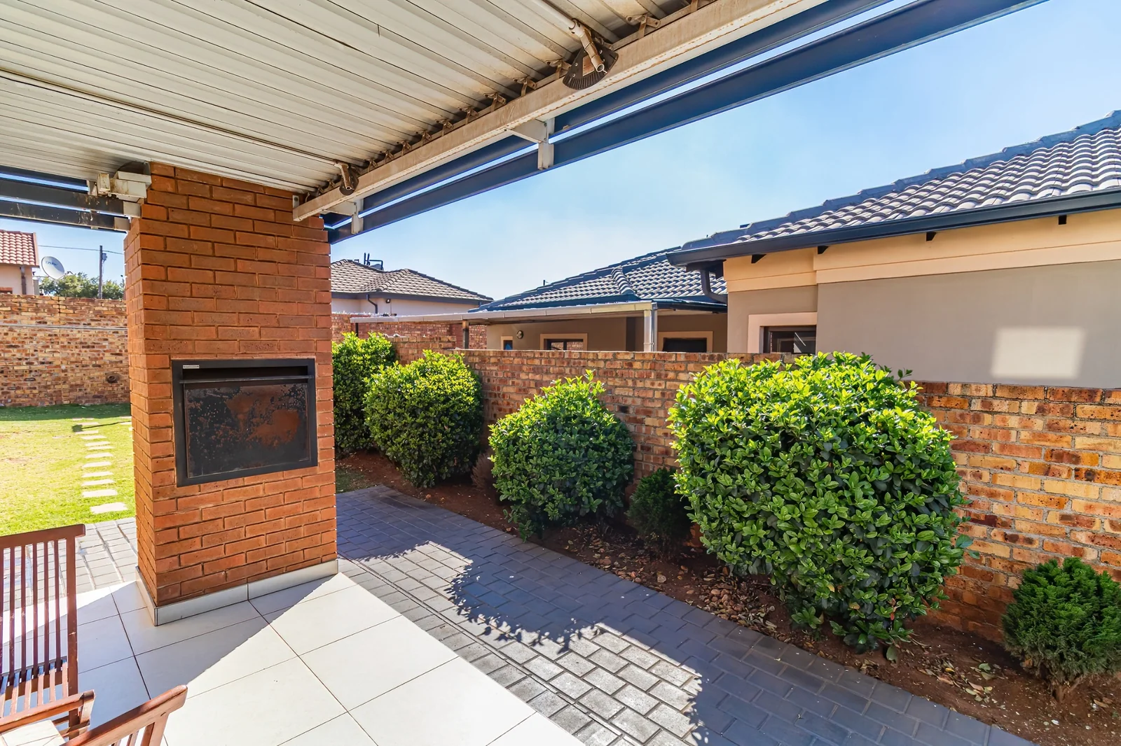 Secure Family Living in Clayville, Midrand: Spacious 4 Bedroom Estate Home with Big Yard.
