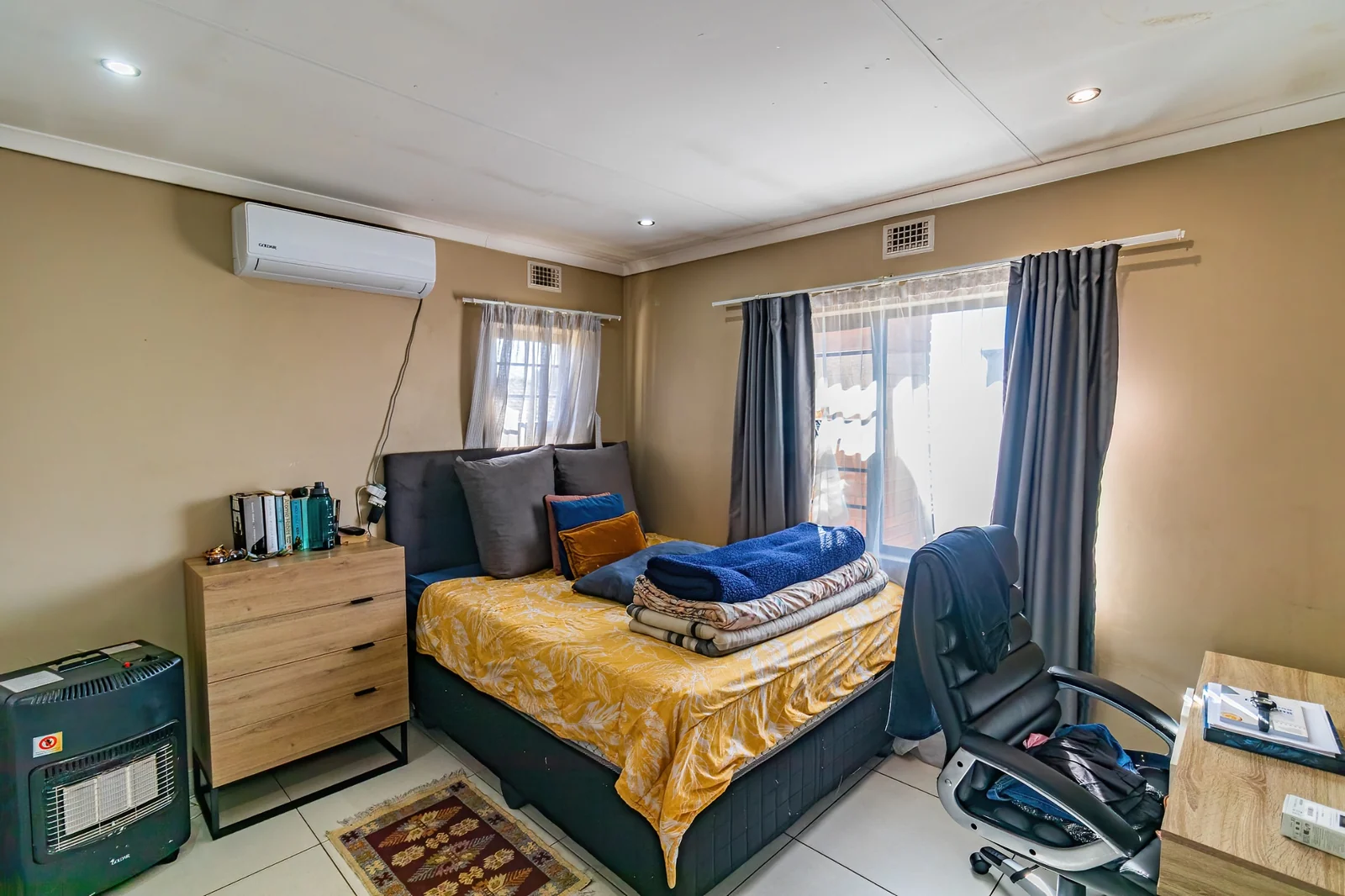 Secure Family Living in Clayville, Midrand: Spacious 4 Bedroom Estate Home with Big Yard.