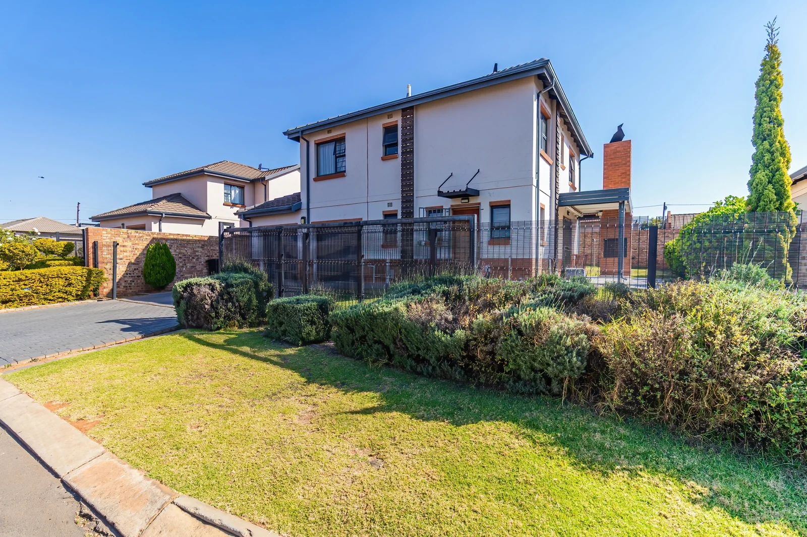 Secure Family Living in Clayville, Midrand: Spacious 4 Bedroom Estate Home with Big Yard.