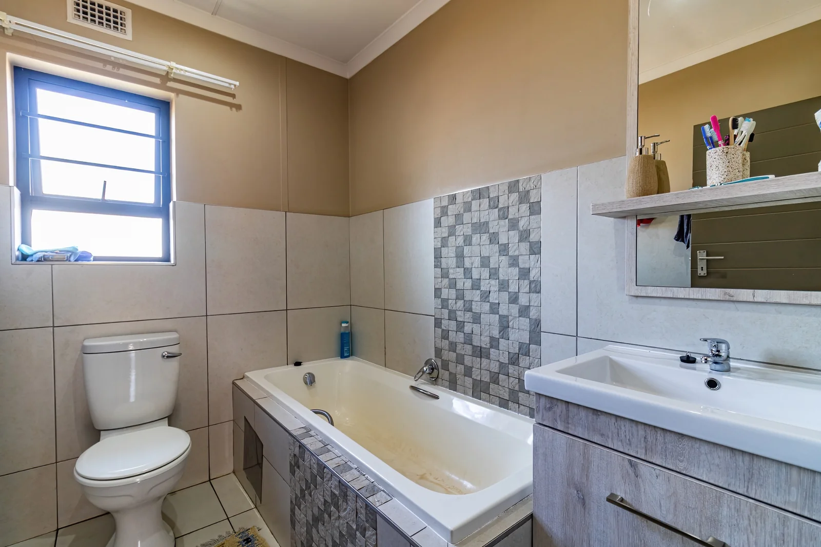 Secure Family Living in Clayville, Midrand: Spacious 4 Bedroom Estate Home with Big Yard.