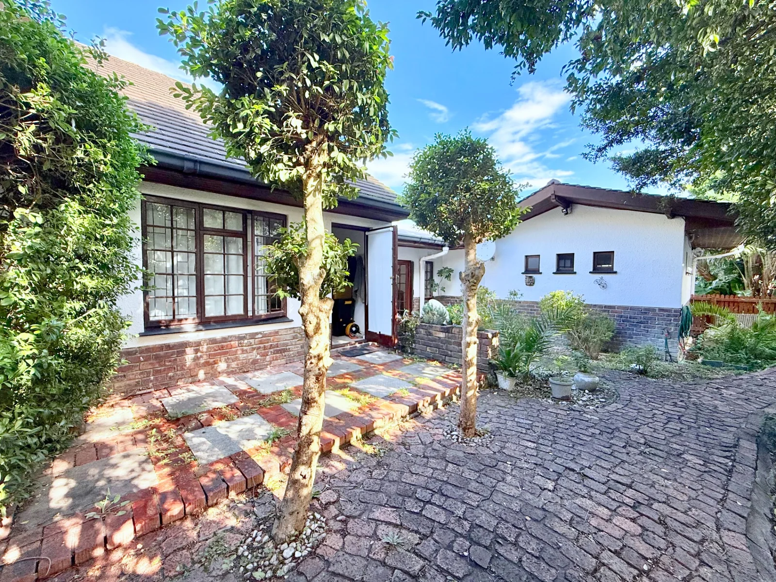 Characterful and spacious four bedroom family home, including self-contained flat, on double plot.
