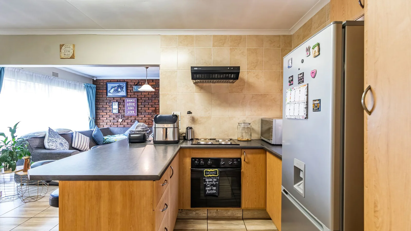 3-BEDROOM HOME WITH PRIVATE 2-BEDROOM FLATLET, INCOME POTENTIAL & ENTERTAINMENT SPACES IN A SECURE BOOMED-OFF AREA