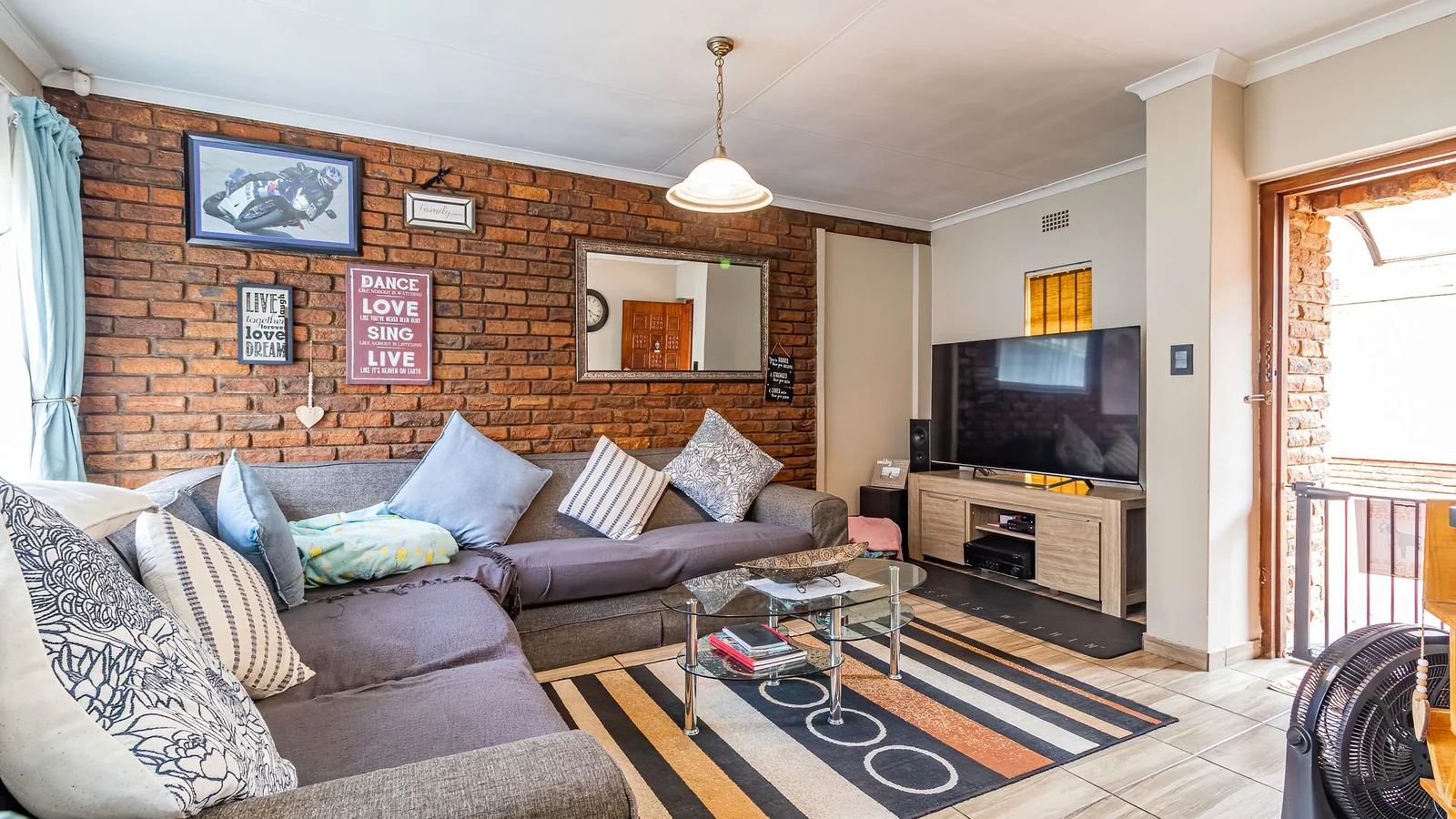3-BEDROOM HOME WITH PRIVATE 2-BEDROOM FLATLET, INCOME POTENTIAL & ENTERTAINMENT SPACES IN A SECURE BOOMED-OFF AREA