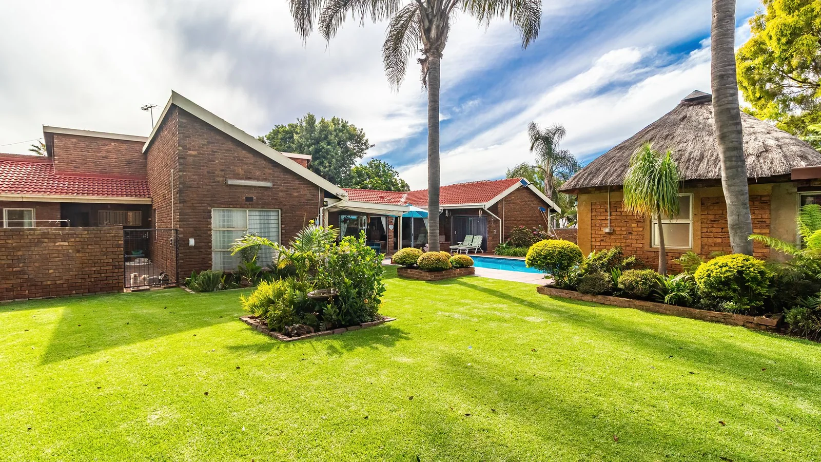 3-BEDROOM HOME WITH PRIVATE 2-BEDROOM FLATLET, INCOME POTENTIAL & ENTERTAINMENT SPACES IN A SECURE BOOMED-OFF AREA