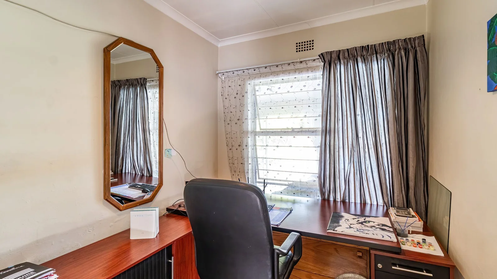 3-BEDROOM HOME WITH PRIVATE 2-BEDROOM FLATLET, INCOME POTENTIAL & ENTERTAINMENT SPACES IN A SECURE BOOMED-OFF AREA