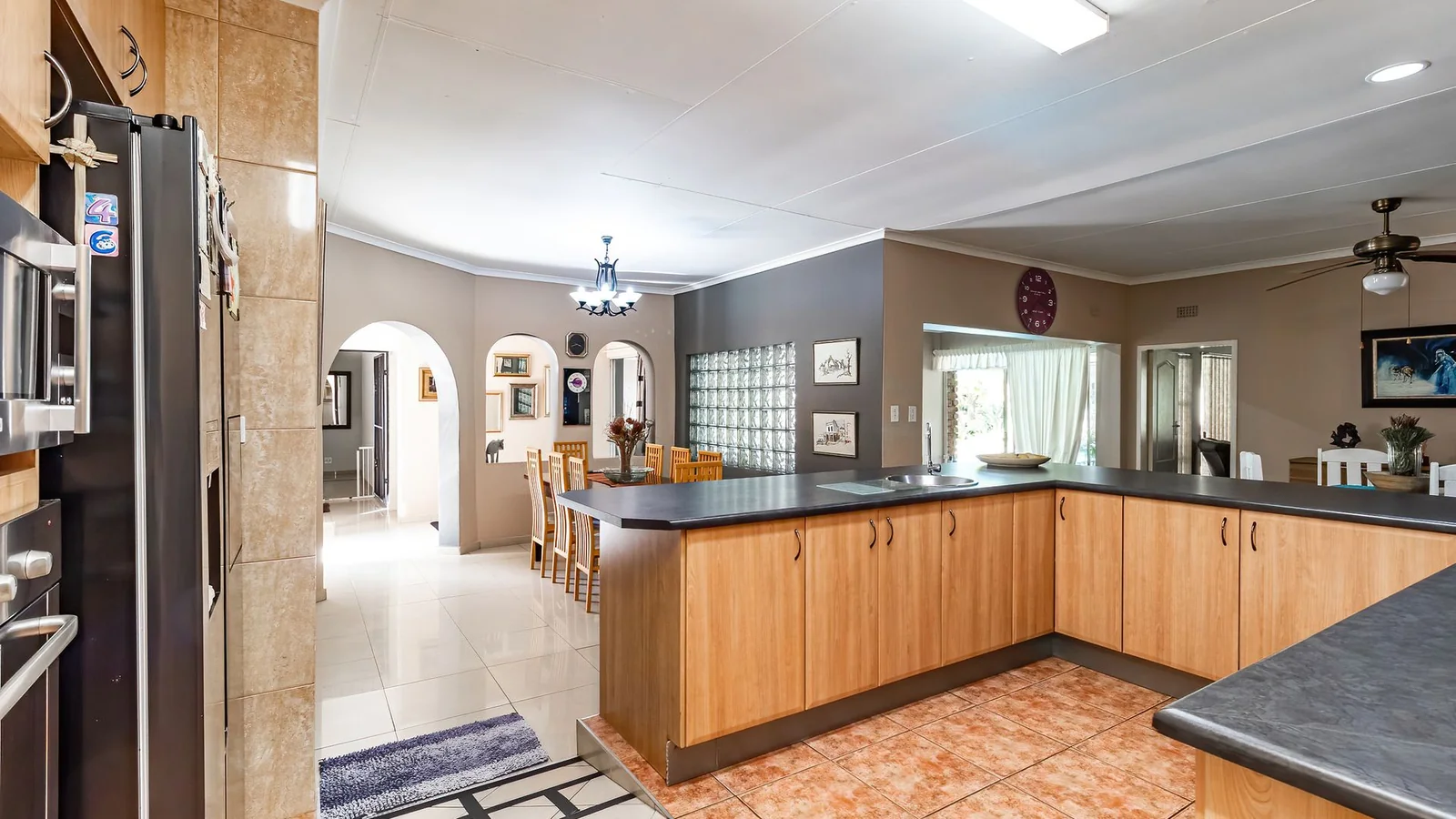 3-BEDROOM HOME WITH PRIVATE 2-BEDROOM FLATLET, INCOME POTENTIAL & ENTERTAINMENT SPACES IN A SECURE BOOMED-OFF AREA