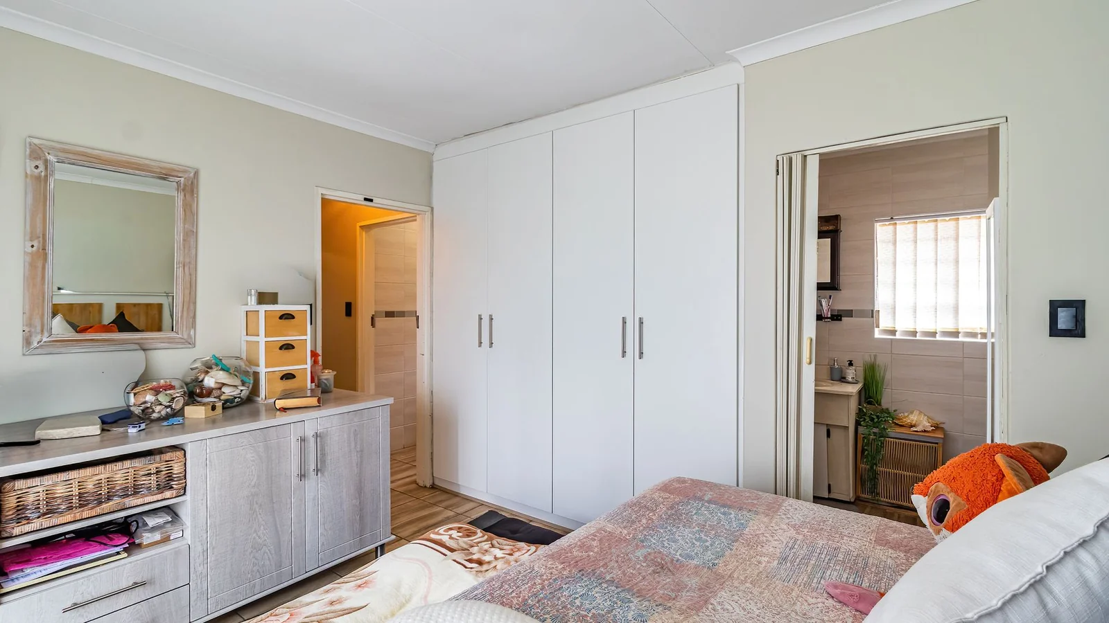 3-BEDROOM HOME WITH PRIVATE 2-BEDROOM FLATLET, INCOME POTENTIAL & ENTERTAINMENT SPACES IN A SECURE BOOMED-OFF AREA