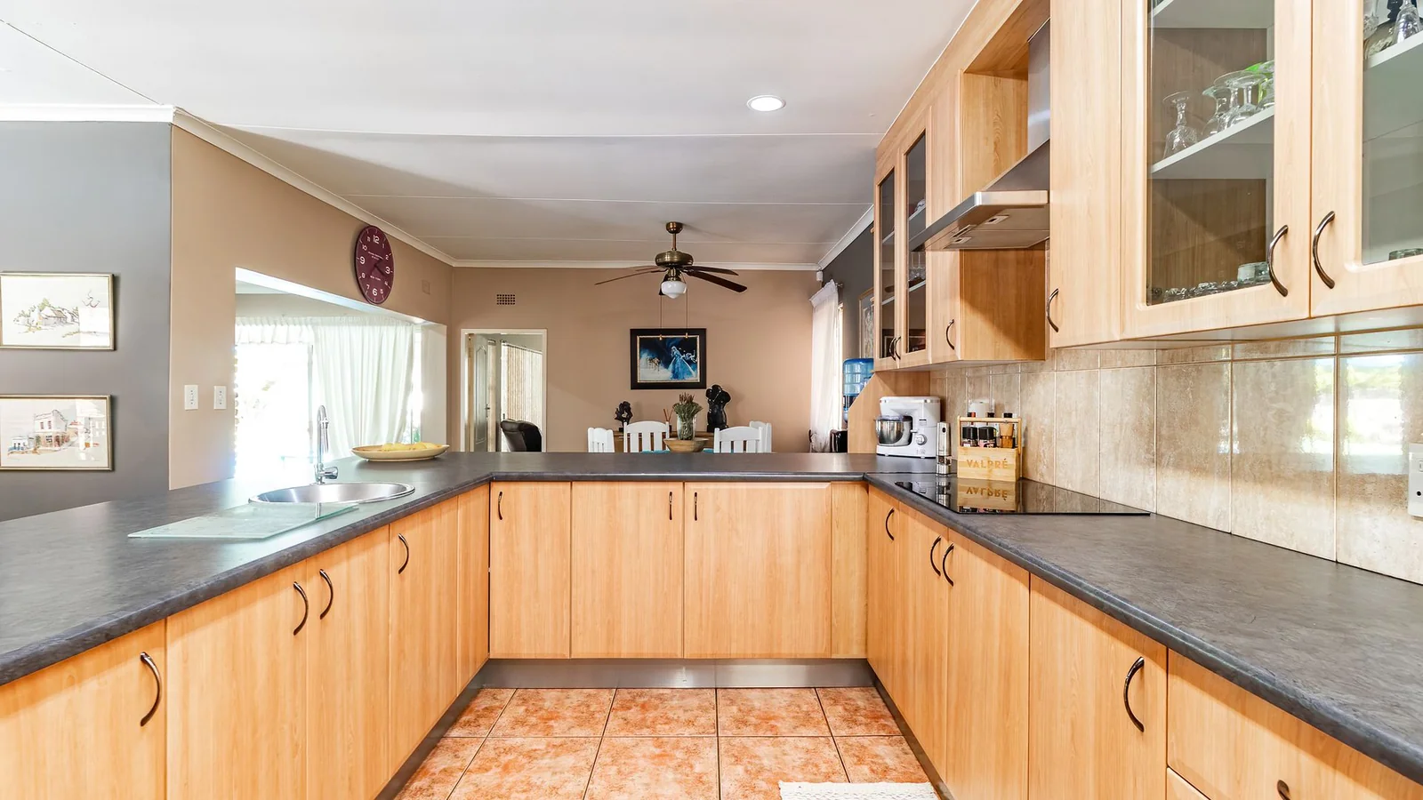 3-BEDROOM HOME WITH PRIVATE 2-BEDROOM FLATLET, INCOME POTENTIAL & ENTERTAINMENT SPACES IN A SECURE BOOMED-OFF AREA