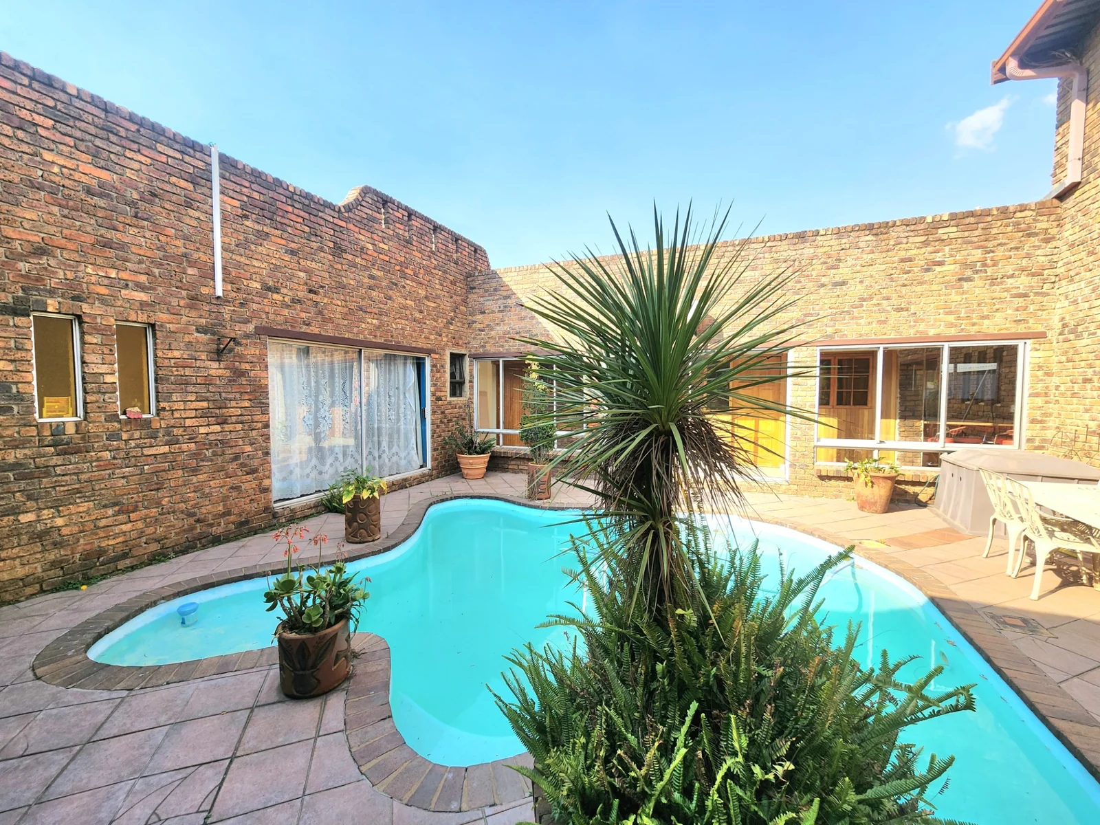 Investment Opportunity – 9-Room Guest House in Secure Lakefield Ext 21
