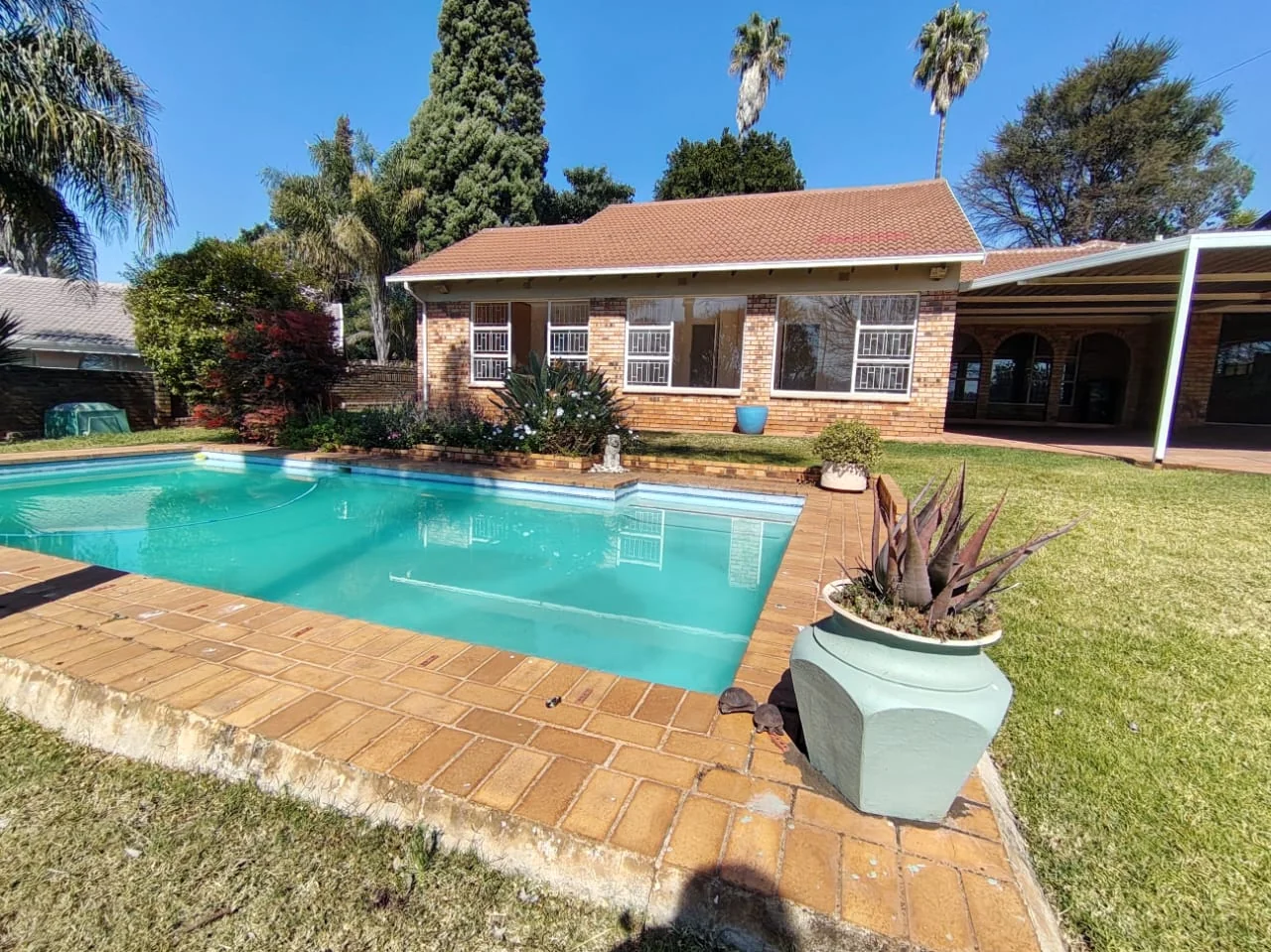 Super Home for the Young or Old including a 1 bedroom flat and very low maintenance home and garden.