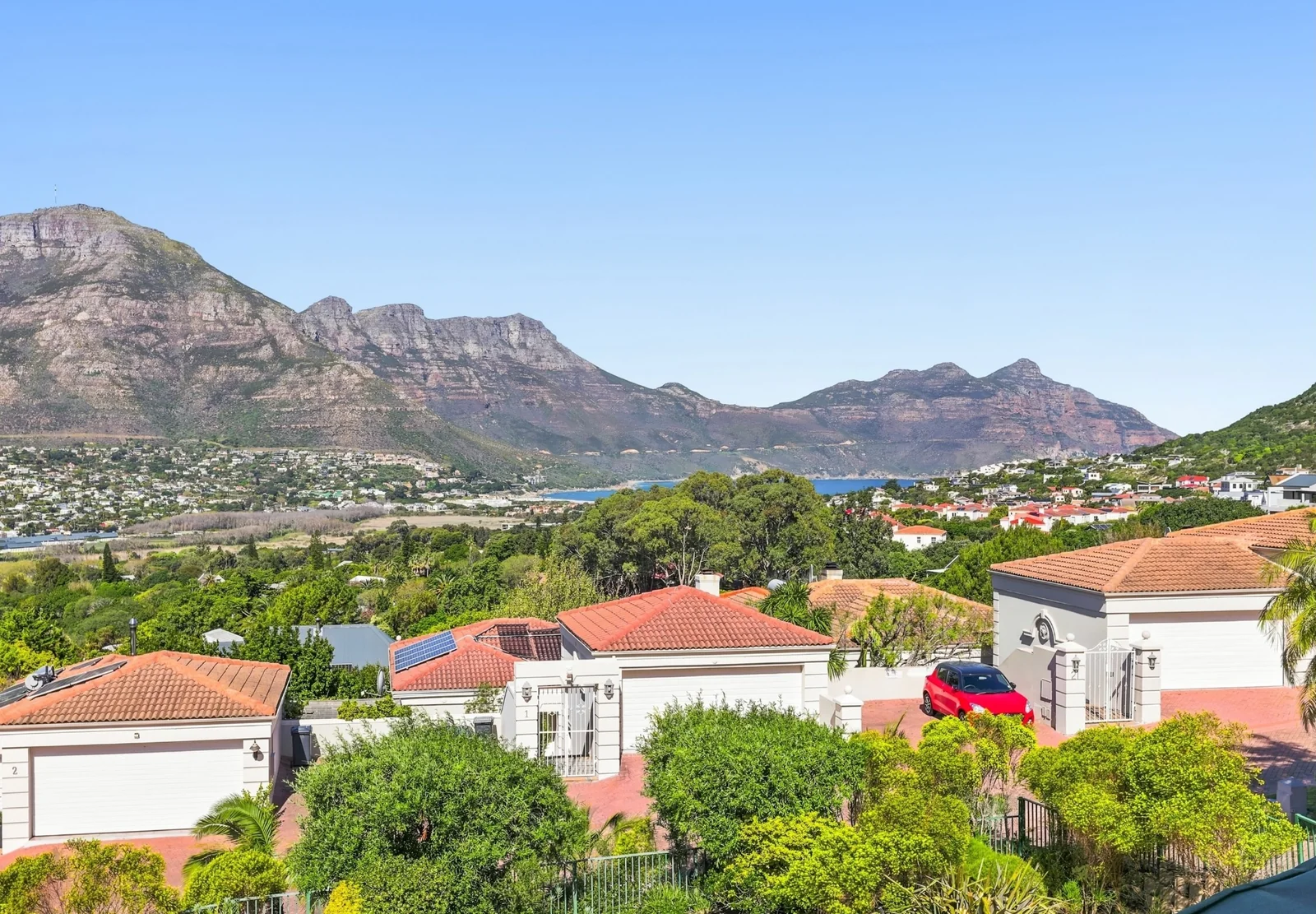 Unique Offering - two adjacent Properties, a 4 bedroom home and adjacent plot of land, in Elevated Security Estate!