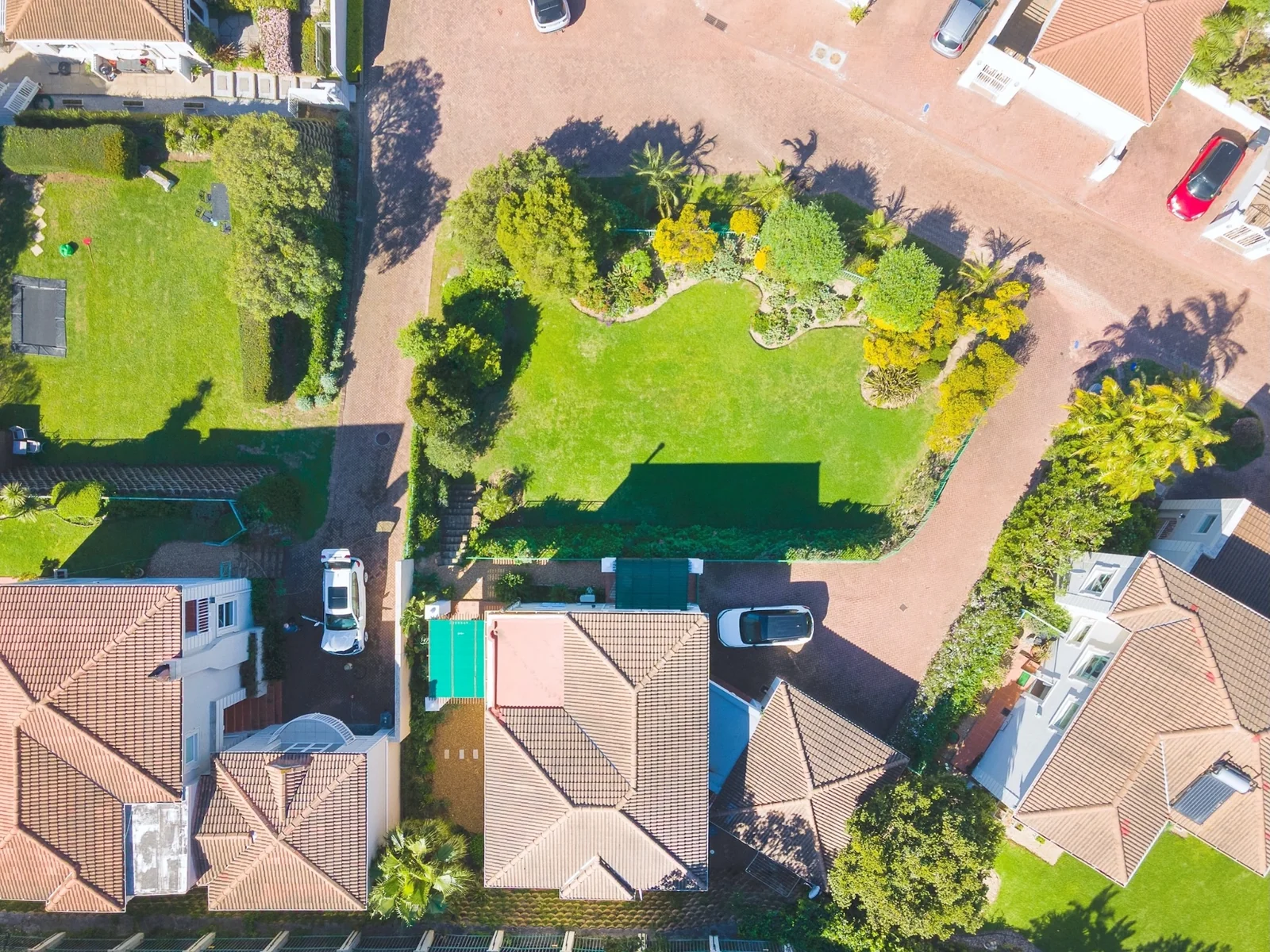 Unique Offering - two adjacent Properties, a 4 bedroom home and adjacent plot of land, in Elevated Security Estate!