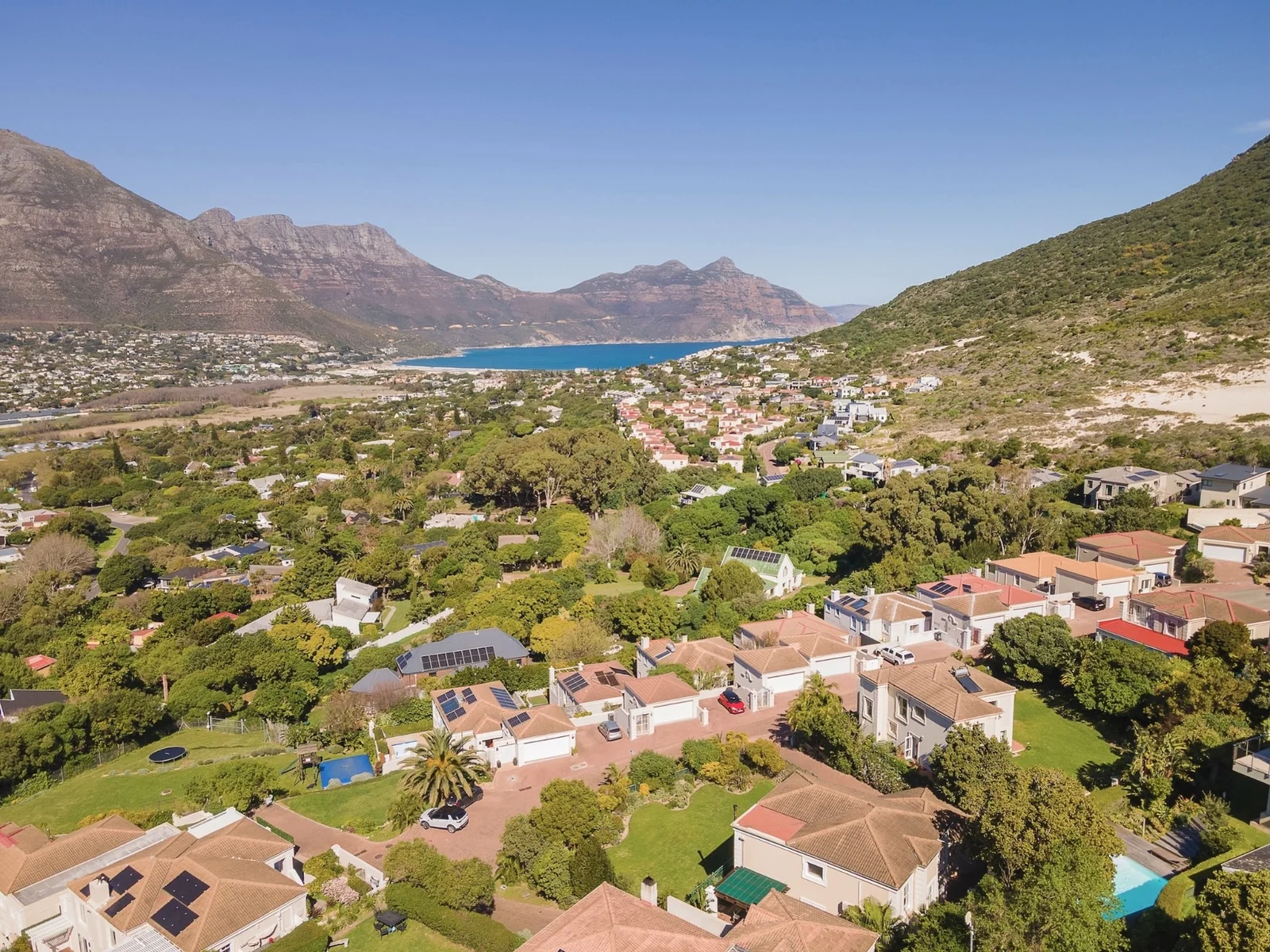 Unique Offering - two adjacent Properties, a 4 bedroom home and adjacent plot of land, in Elevated Security Estate!