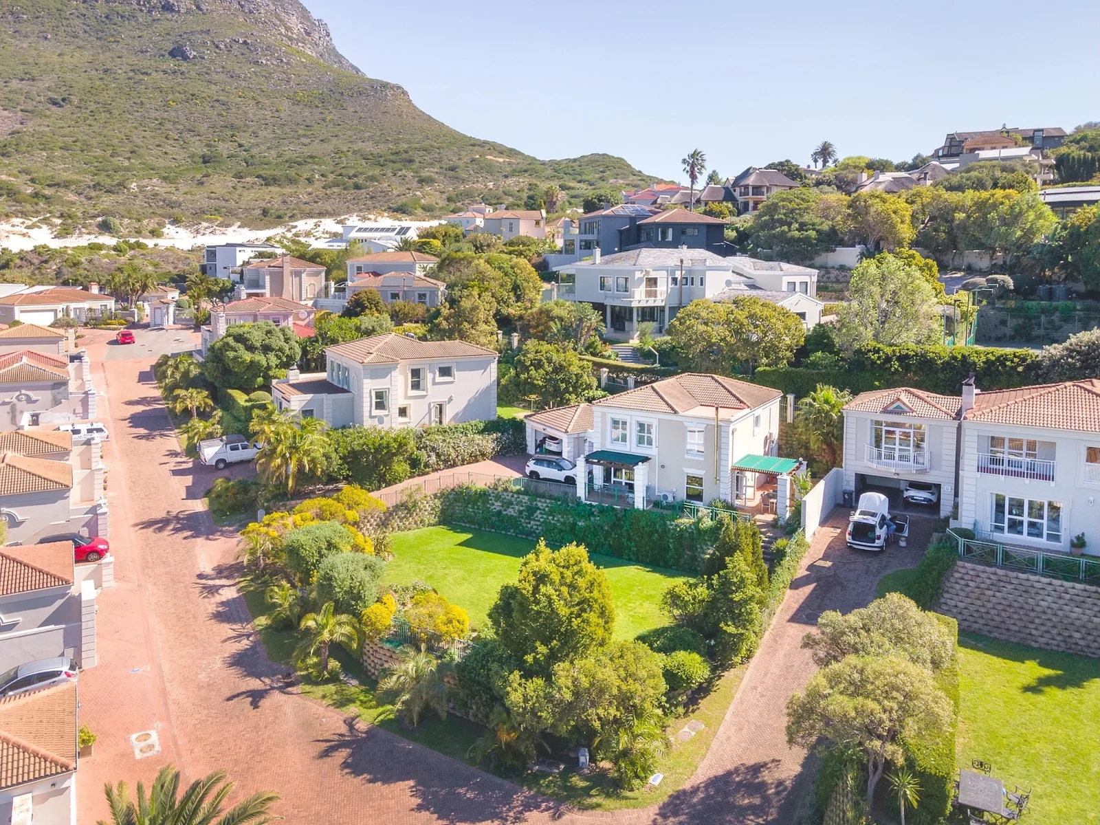 Unique Offering - two adjacent Properties, a 4 bedroom home and adjacent plot of land, in Elevated Security Estate!