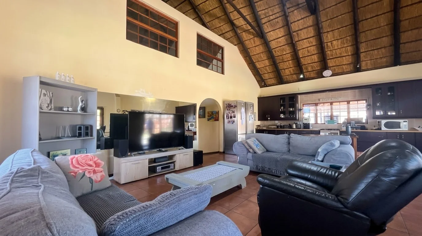 Spacious 3 Bedroom Thatch Home on a Generous Corner Stand
