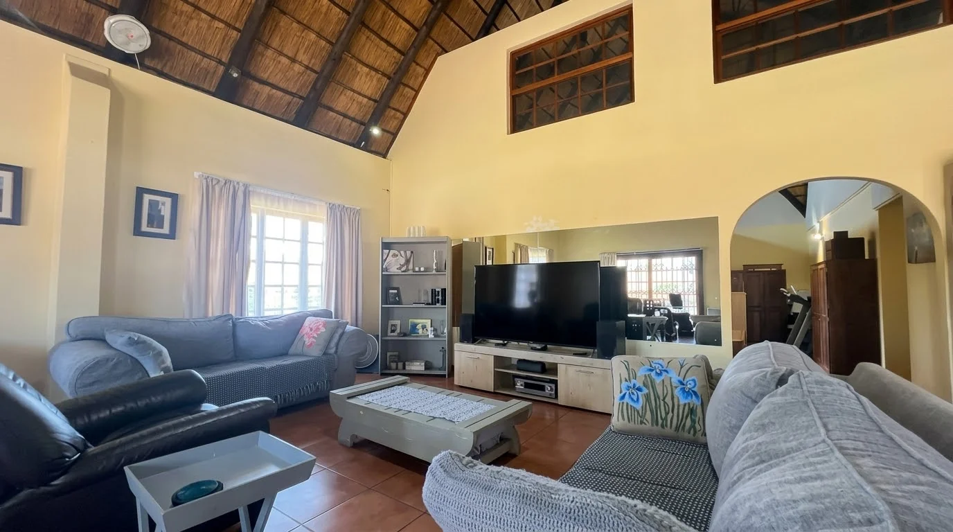 Spacious 3 Bedroom Thatch Home on a Generous Corner Stand