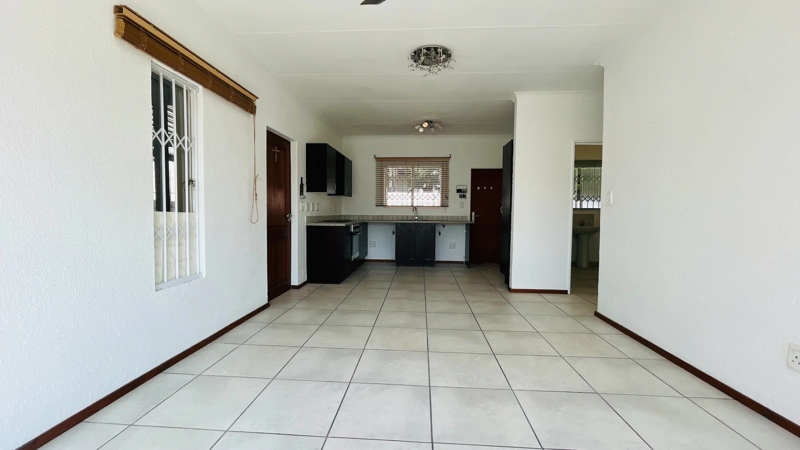 Charming 2-Bedroom Rental with Wrap-Around Garden in Amorosa.<br/>