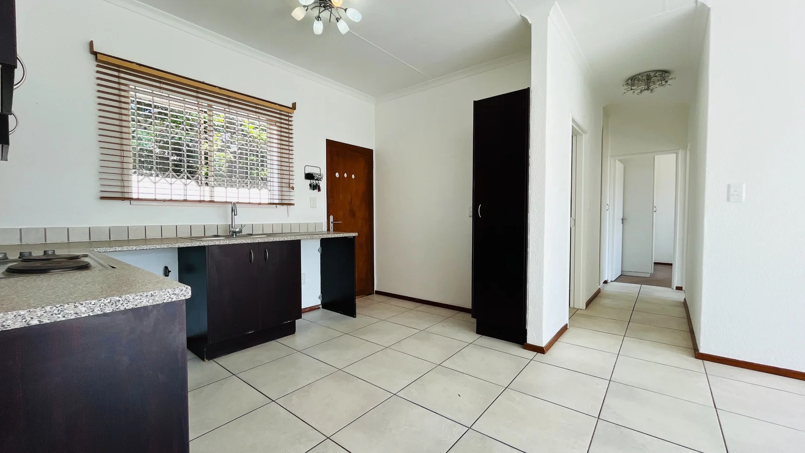 Charming 2-Bedroom Rental with Wrap-Around Garden in Amorosa.<br/>