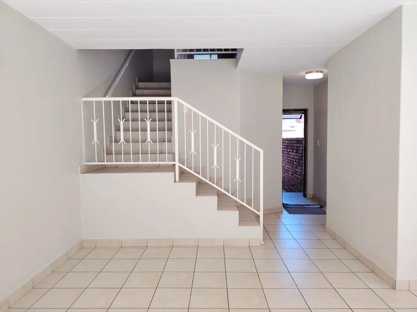 Fabulously Renovated, Spacious and Light-Filled Town House in Sought-After Small Complex.