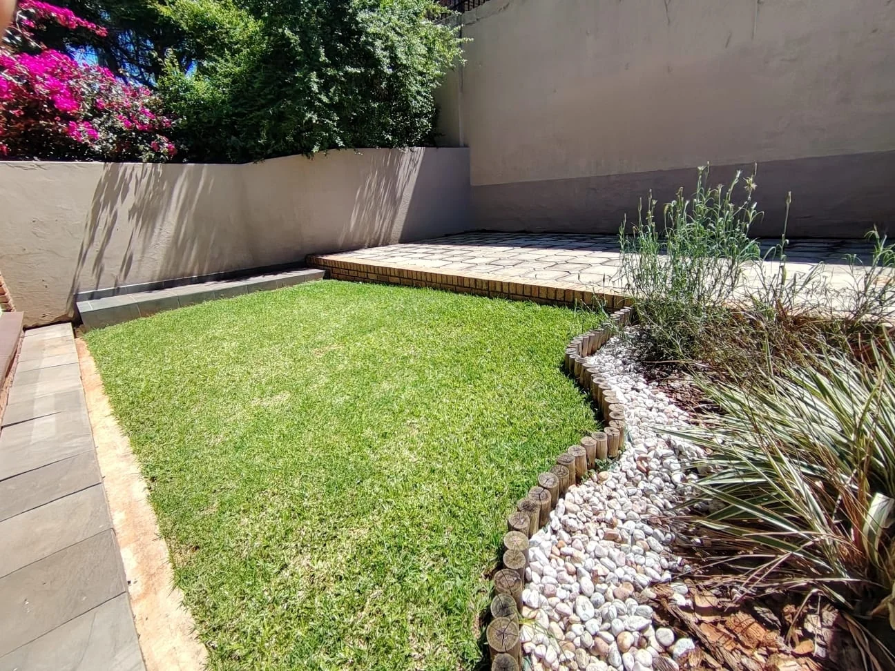 Fabulously Renovated, Spacious and Light-Filled Town House in Sought-After Small Complex.