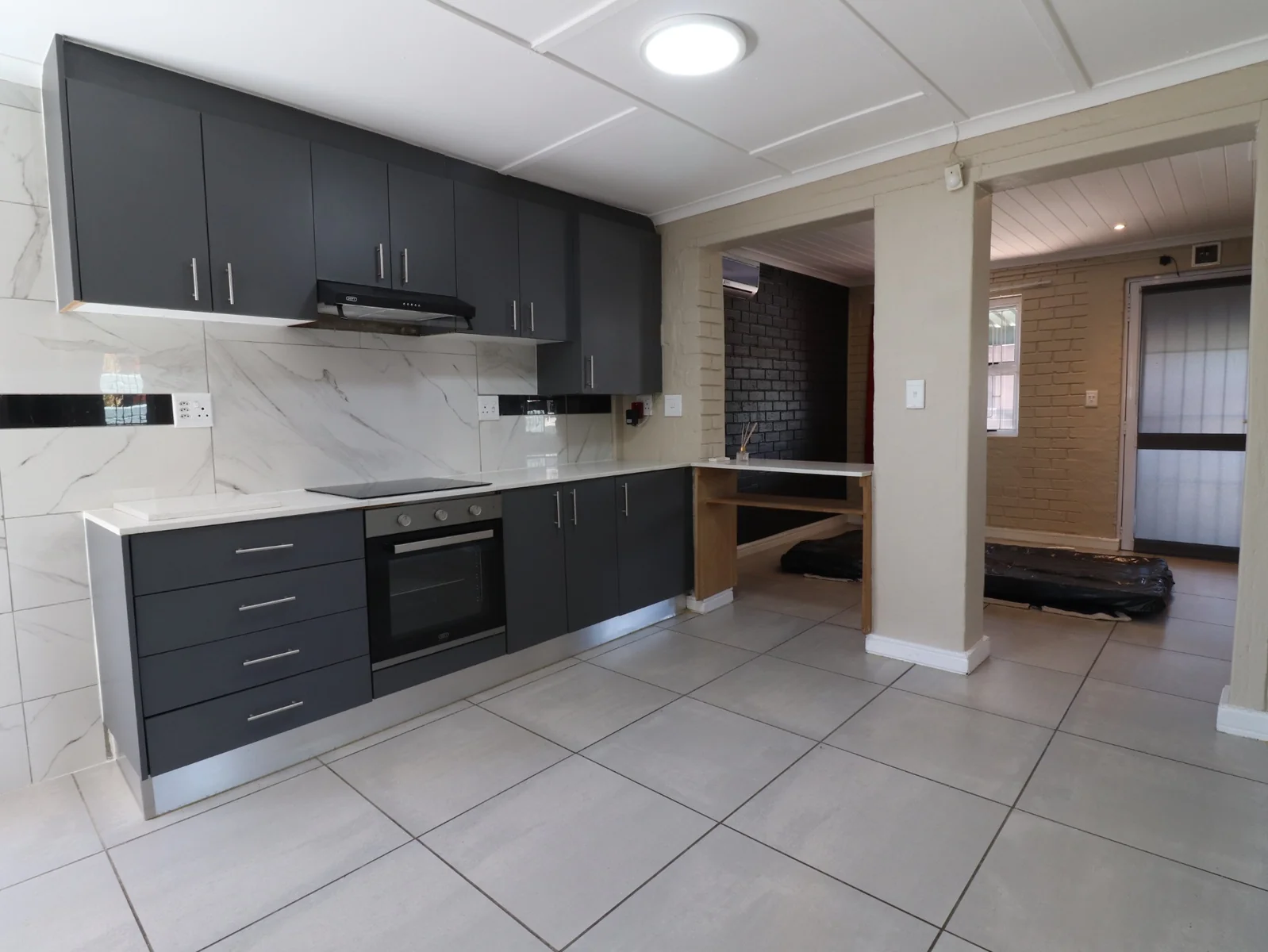 Compact 2-Bedroom Home, Open Parking and Yard
